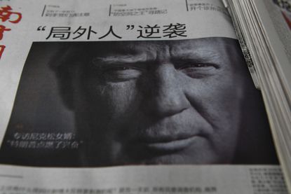 A Chinese newspaper featuring Trump