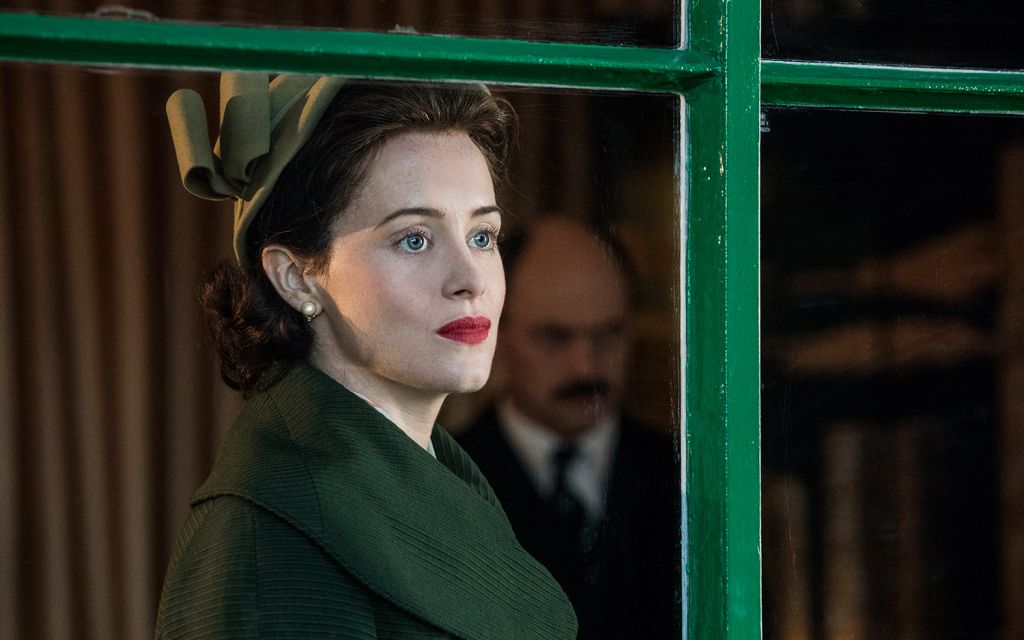 Claire Foy stares out the window in The Crown