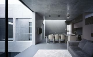 Grigio in Tokyo, Japan was created in all minimalist concrete glory by Apollo Architects & Associates