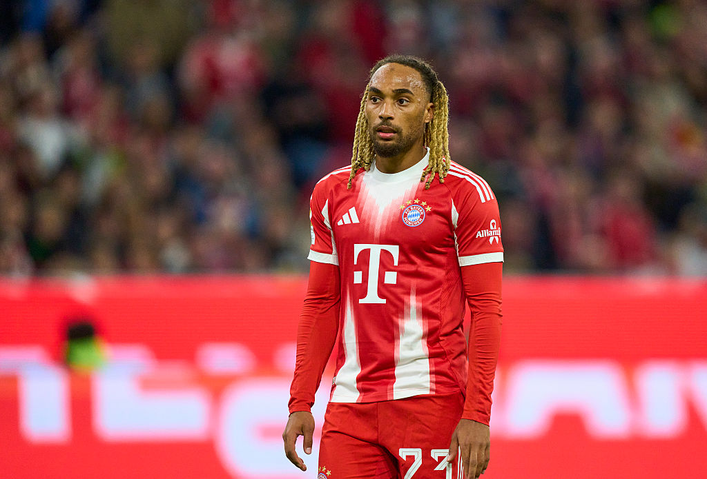 Sacha Boey of FC Bayern M&amp;uuml;nchen reacts during the Bundesliga match between FC Bayern M&amp;uuml;nchen and Borussia Dortmund at Allianz Arena on October 18, 2025 in Munich, Germany.