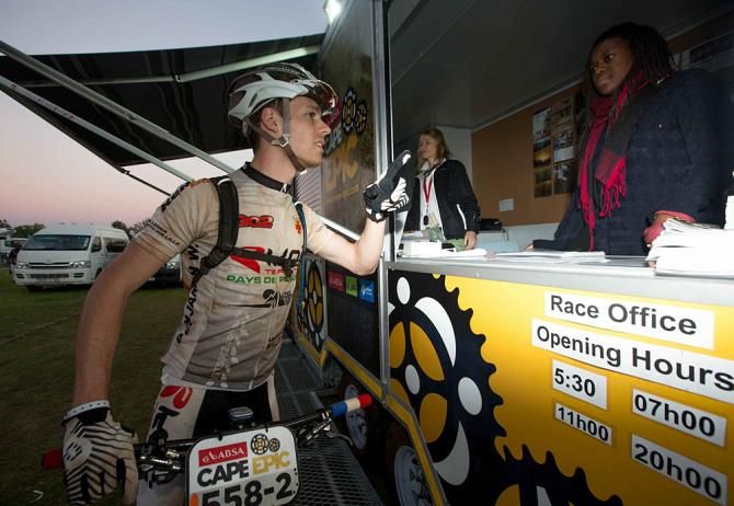 Benjamin Wiliette makes an enquiry at the race office