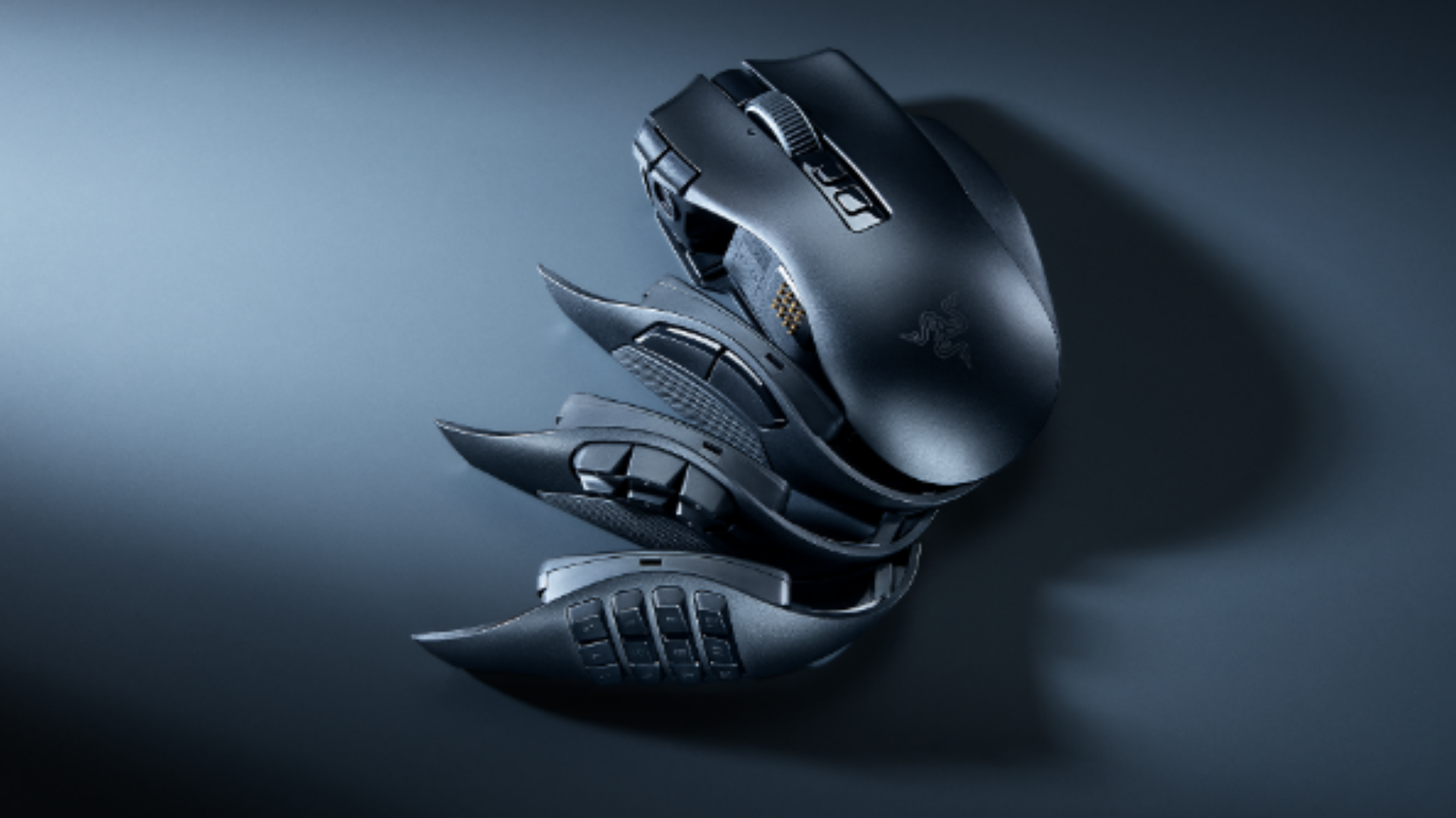 Razer Naga V3 Pro on a white, grey, and black background with its three sideplates next to it