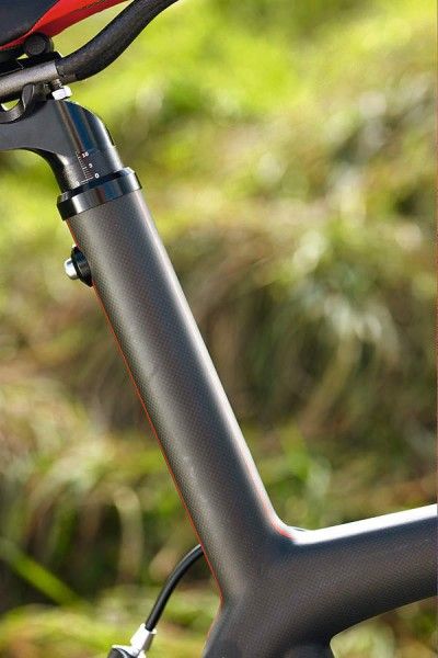 Extended seat tube and dedicated seat post.