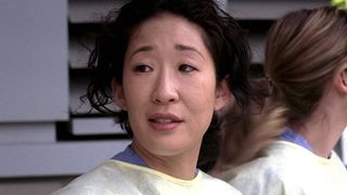 Sandra Oh is shown as Cristina Yang on Grey's Anatomy.
