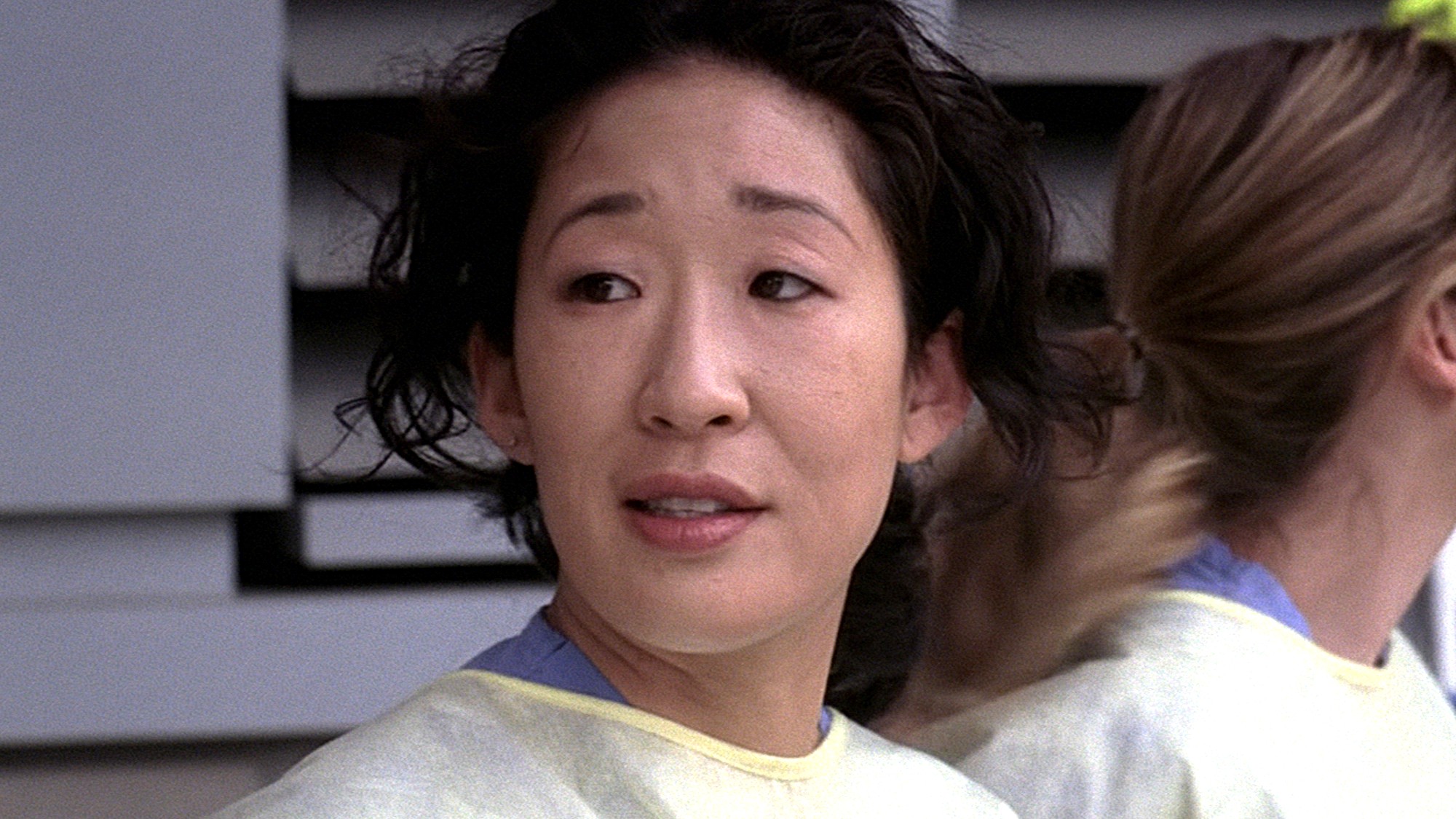 Sandra Oh is shown as Cristina Yang on Grey's Anatomy.