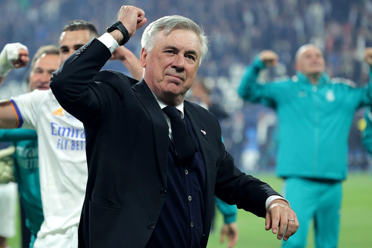 Real Madrid manager Carlo Ancelotti celebrates his side's victory over Liverpool in the 2022 Champions League final at the Stade de France in Paris, France