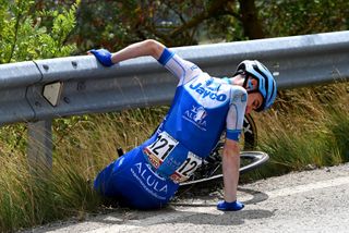 BURRIANA SPAIN AUGUST 30 Eddie Dunbar of Ireland and Team Jayco AlUla crashes during the 78th Tour of Spain 2023 Stage 5 a 1846km stage from Burriana to Burriana UCIWT on August 30 2023 in Morella Spain Photo by Tim de WaeleGetty Images