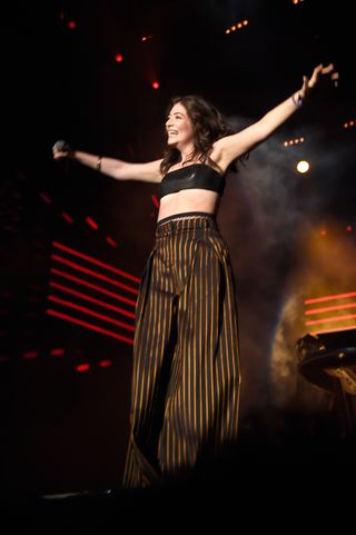 Best Coachella Fashion Looks | Guest singer Lorde performs onstage during the Disclosure show during day 2 of the 2016 Coachella Valley Music & Arts Festival Weekend 1 at the Empire Polo Club on April 16, 2016 in Indio, California.