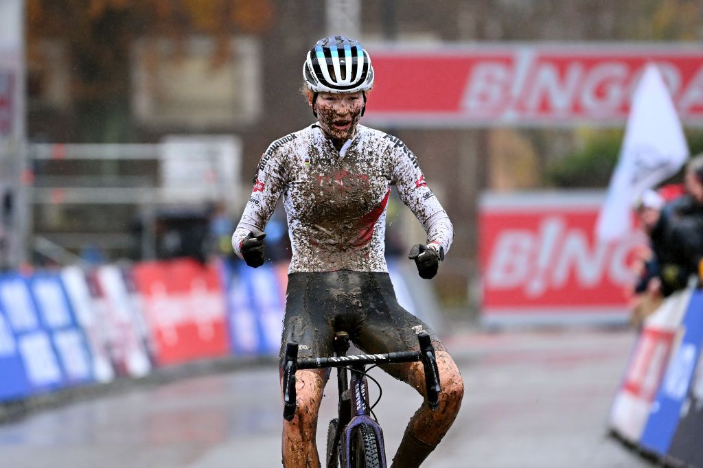OVERIJSE BELGIUM NOVEMBER 20 Puck Pieterse of The Netherlands and Team Alpecin Deceuninck celebrates at finish line as race winner during the 62nd UCI Cyclocross World Cup Druivencross Overijse 2022 Womens Elite CXWorldCup Overijse Cyclocross on November 20 2022 in Overijse Belgium Photo by Luc ClaessenGetty Images