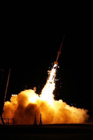 One of five sounding rockets launches on March 27, 2012 as part of the ATREX mission from NASA's Wallops Flight Facility on Wallops Island in Virginia to light up the predawn sky with glowing clouds at the edge of space.