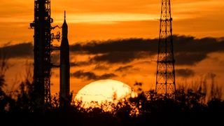 NASA's Space Launch System rocket with the Orion capsule atop looks stunning in this sunrise shot taken by NASA photographer Bill Ingalls.