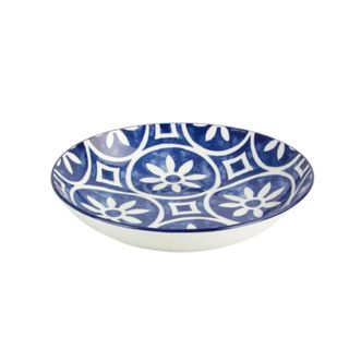 A blue and white patterned plate bowl