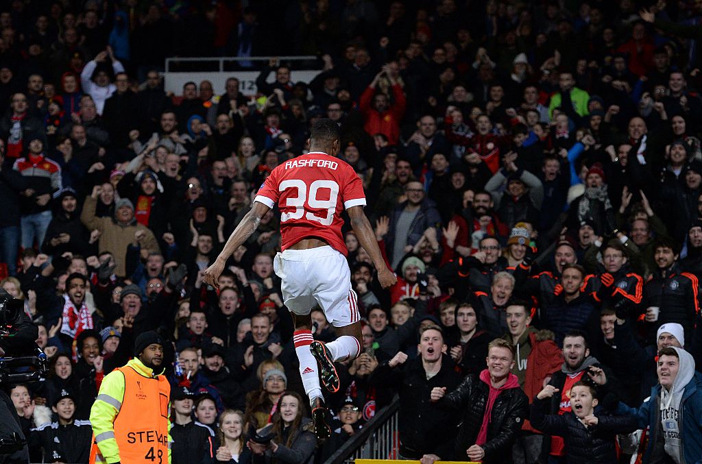 Manchester United's English striker Marcus Rashford celebrates scoring his team's second goal during the UEFA Europa League round of 32, second leg football match between Manchester United and and FC Midtjylland at Old Trafford in Manchester, north west England, on February 25, 2016.