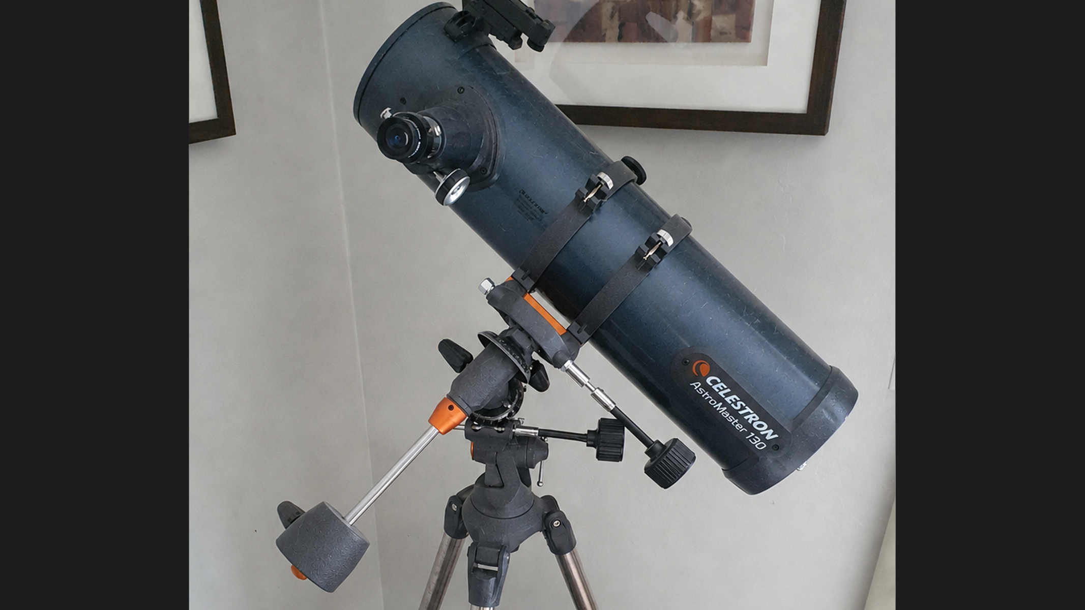A Celestron Astromaster 130EQ, slightly dusty.