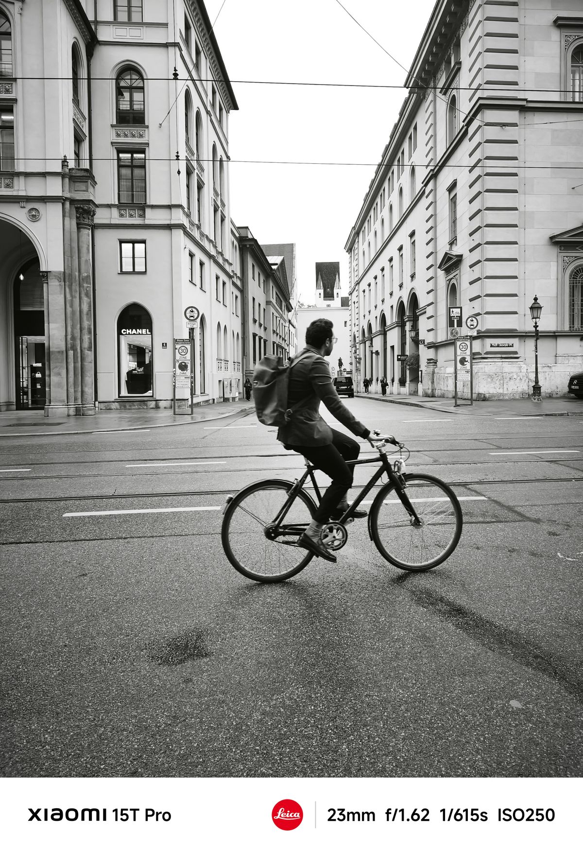 A person cycling across a street in Munich Germany
