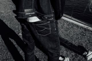 Close up of pair of Jacob Cohen jeans in black and white