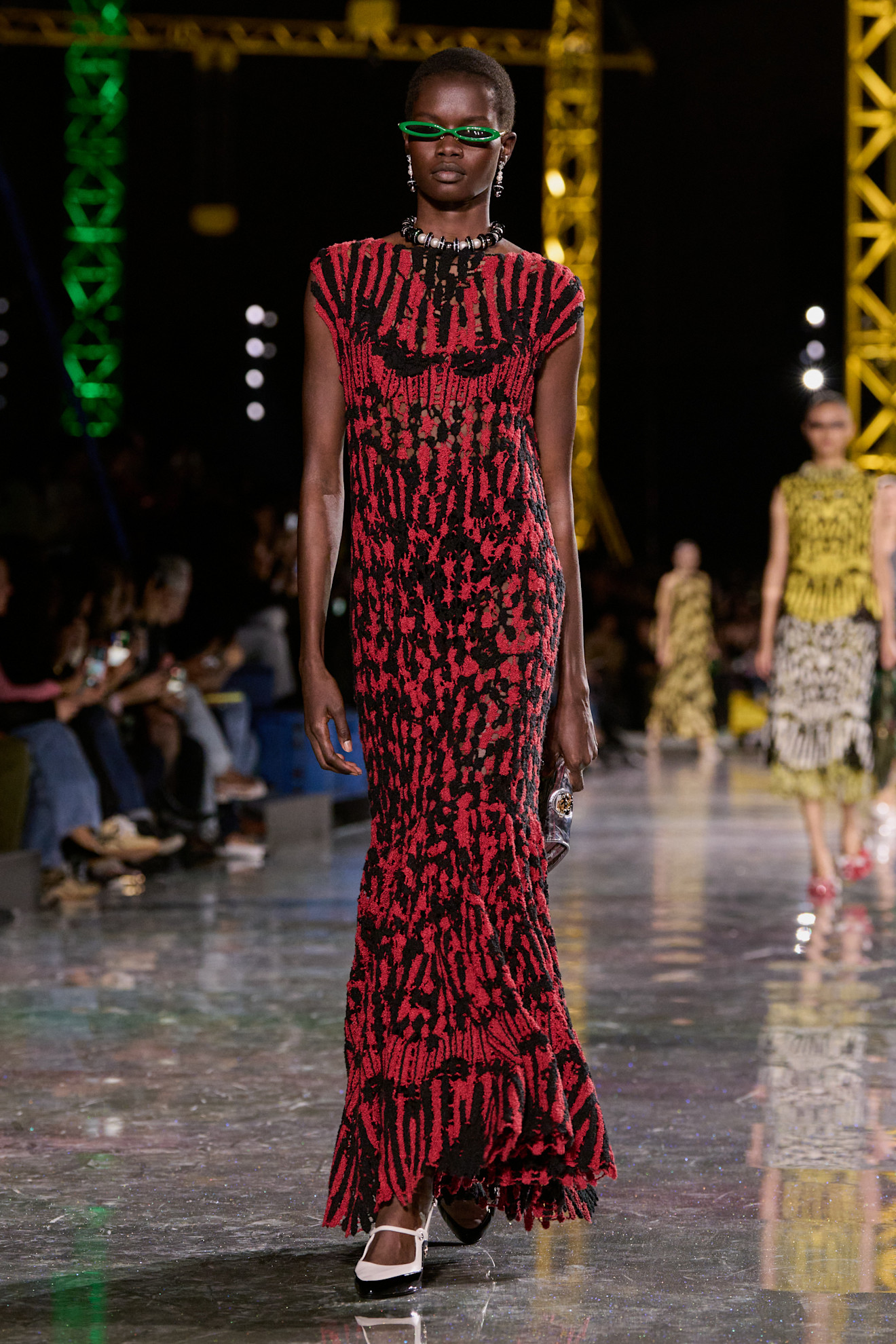 A model wore the red-and-black color combination trend on the Chanel Fall 2026 runway