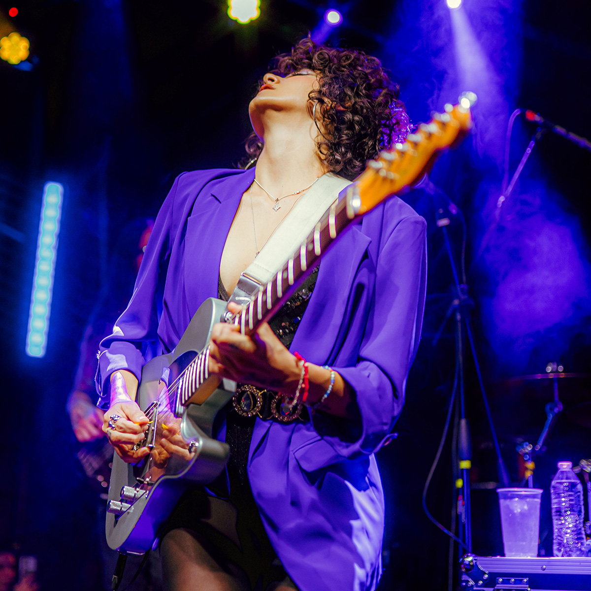 Renee playing a fender tele on stage