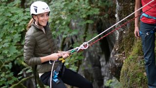 Catherine, Duchess of Cambridge abseils during a visit to the Windermere Adventure Training Centre with RAF Cadets on September 21,2021 in Windermere,United Kingdom.