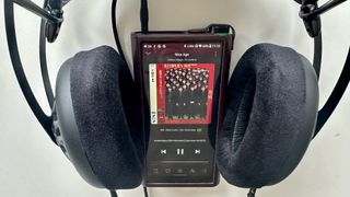 Meze Audio 105 AER headphones in a hi-fi testing room, on gray background