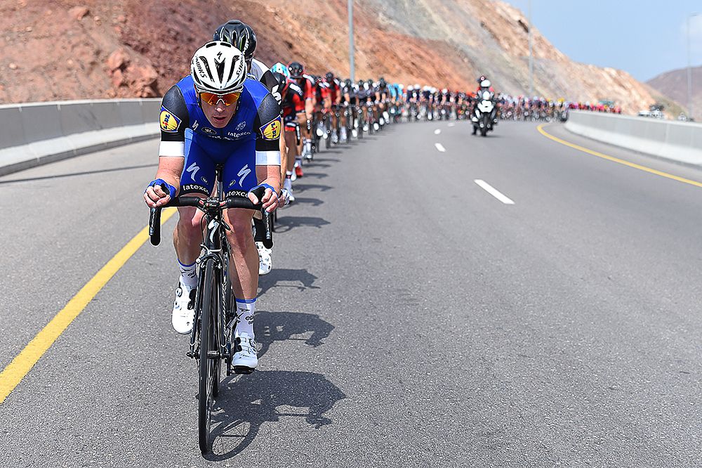Iljo Kiesse drives the peloton.