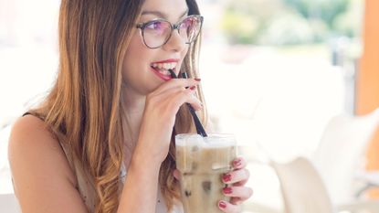 woman drinking cold brew