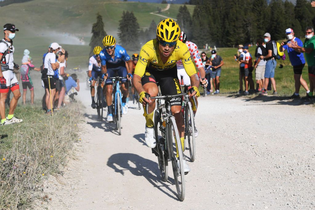 LA ROCHESURFORON FRANCE SEPTEMBER 17 Primoz Roglic of Slovenia and Team Jumbo Visma Yellow Leader Jersey Tadej Pogacar of Slovenia and UAE Team Emirates Polka Dot Mountain Jersey Sepp Kuss of The United States and Team Jumbo Visma Enric Mas Nicolau of Spain and Movistar Team White Best Young Rider Jersey Carlos Verona Quintanilla of Spain and Movistar Team Monte du plateau des Glires 1390m Gravel Strokes Peloton Dust Fans Public during the 107th Tour de France 2020 Stage 18 a 175km stage from Mribel to La Roche sur Foron 543m TDF2020 LeTour on September 17 2020 in La RochesurForon France Photo by Tim de WaeleGetty Images