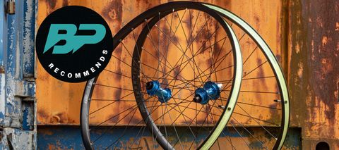 Hope Fortus 30 SC Pro 5 wheels outside a rusty shipping container