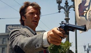 Dirty Harry Clint Eastwood pointing his gun off camera
