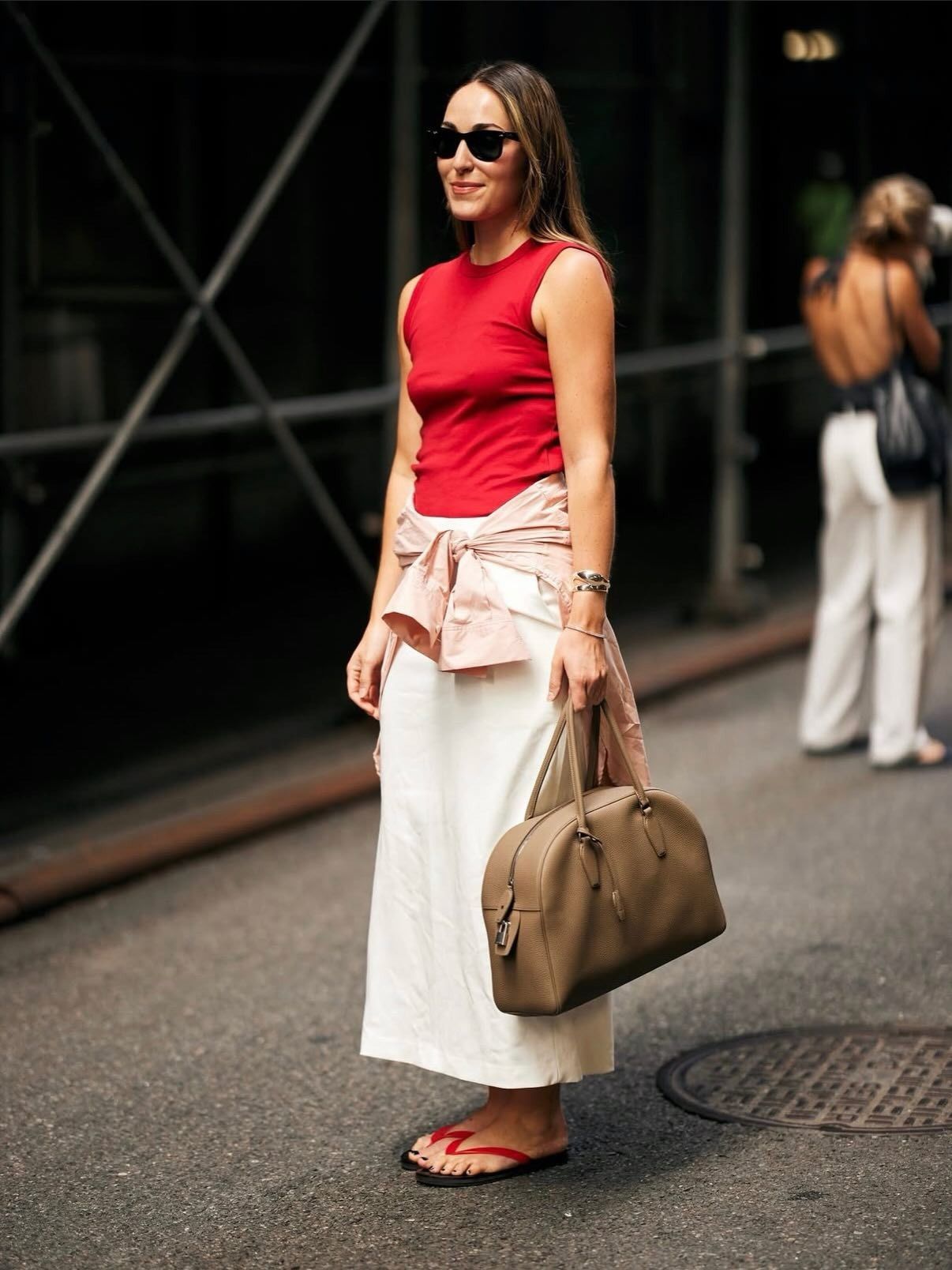 Woman wearing summer 2026 outfit featuring the colorful t-shirt trend.