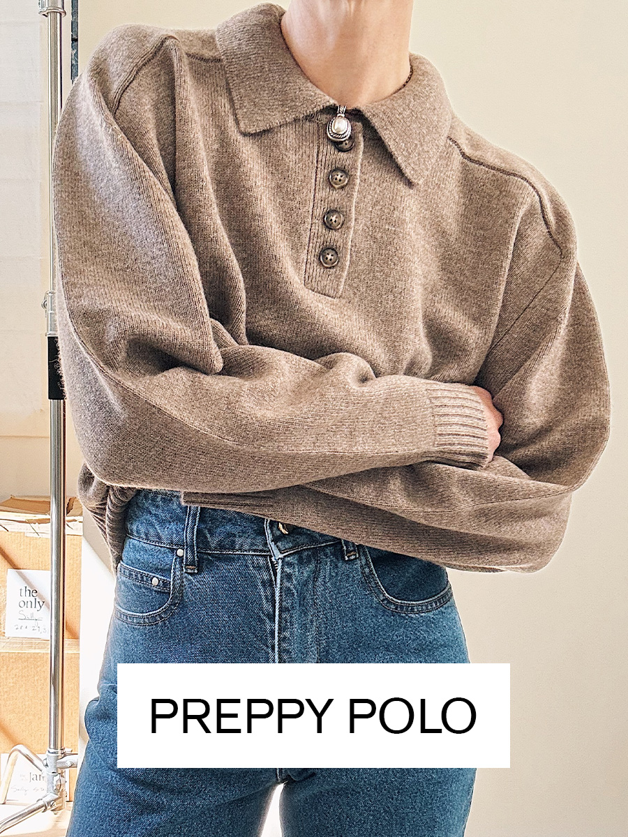 Woman in polo sweater and jeans