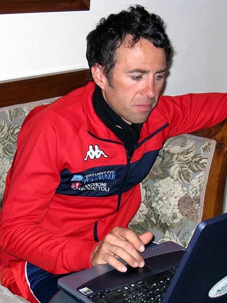 Gilberto Simoni, the night before Eroica, fine tunes his Giro d'Italia training programme with DS Giovanni Ellena.