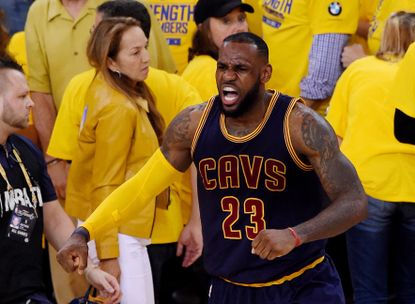 Cleveland wins Game 2 of the NBA finals, and LeBron James celebrates.