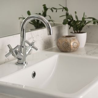 bathroom with wash basin and tap