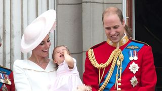 Catherine, Duchess of Cambridge, Princess Charlotte, Prince George and Prince William, Duke of Cambridge stand on the balcony of Buckingham Palace during the Trooping the Colour, this year marking the Queen's 90th birthday at The Mall on June 11, 2016 in London, England