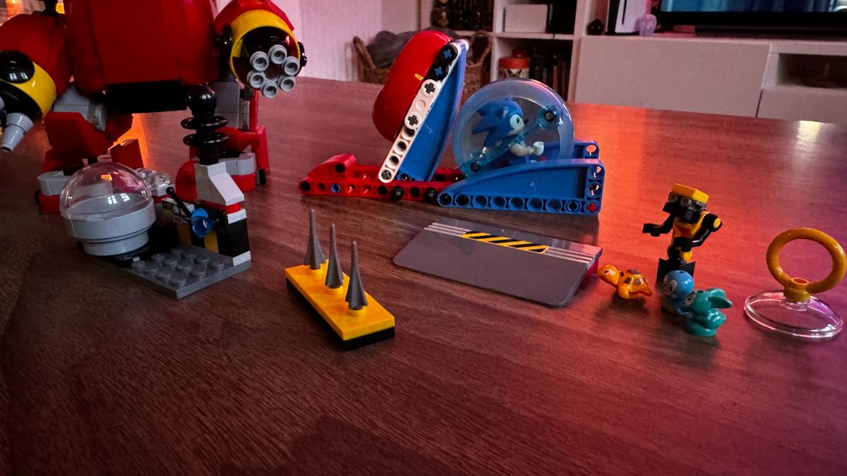 Lego Sonic vs. Dr. Eggman's Death Egg Robot pieces on a wooden coffee table