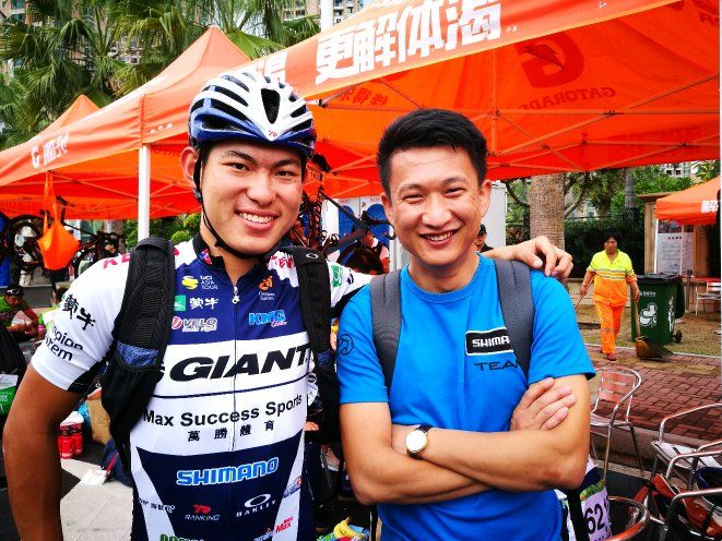 China's only Tour de France rider Ji Cheng, now retired, with China games time trial champion Shi Hang