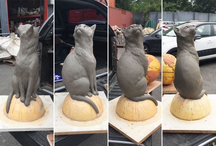 A clay model of the F&eacute;licette statue. The final product will feature the cat sitting on top of a globe of the Earth.