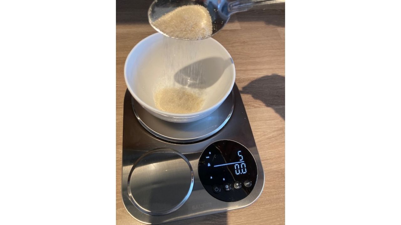 Measuring baking ingredients in our tester's kitchen, using the Salter Dual Platform Scale