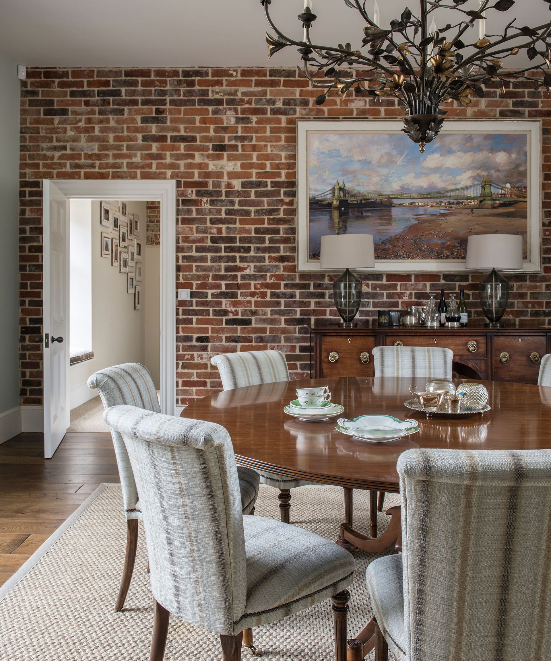 Dining room ideas exposed brick wall upholstered chairs