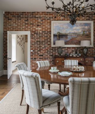 Dining room ideas exposed brick wall upholstered chairs