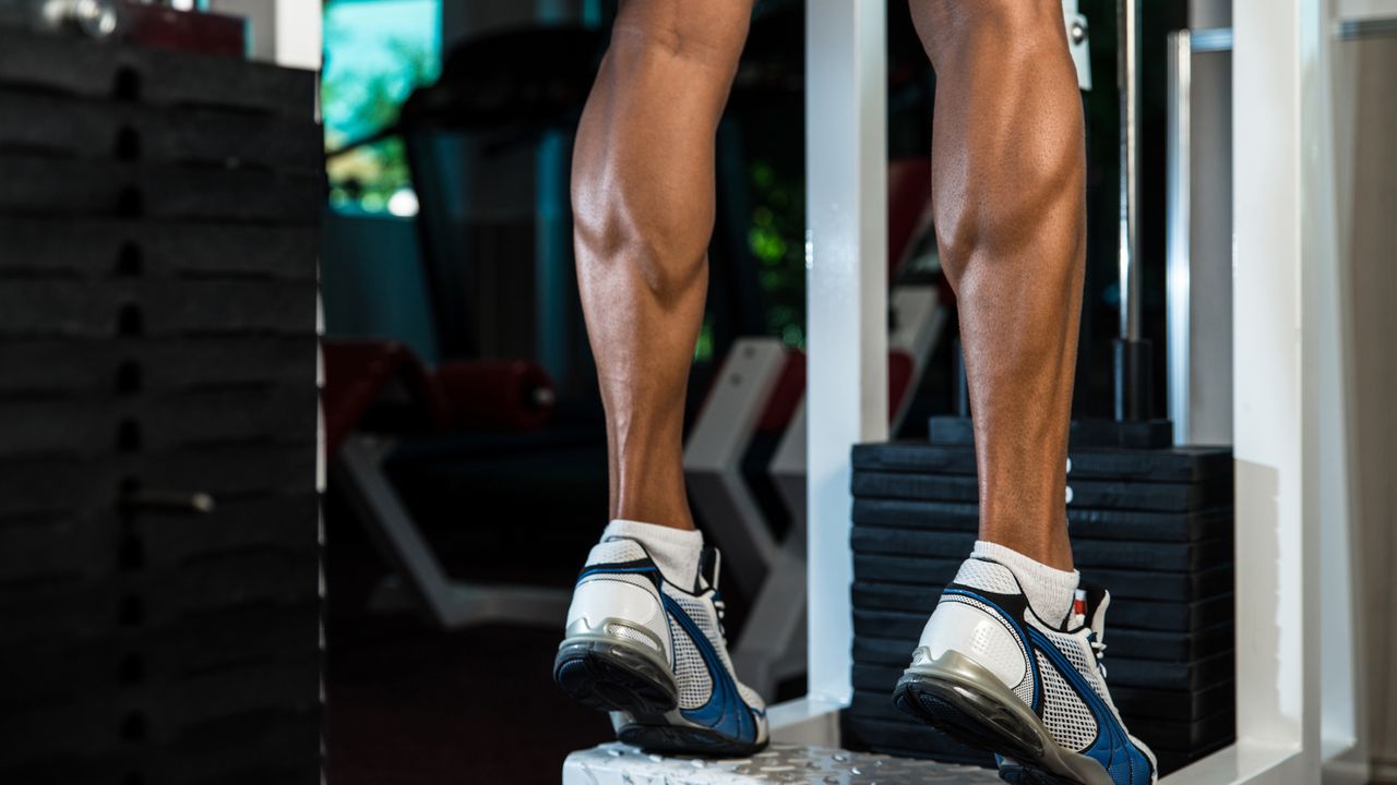 Bodybuilders Legs Shot In A Gym In Workout