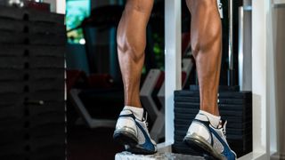 Bodybuilders Legs Shot In A Gym In Workout