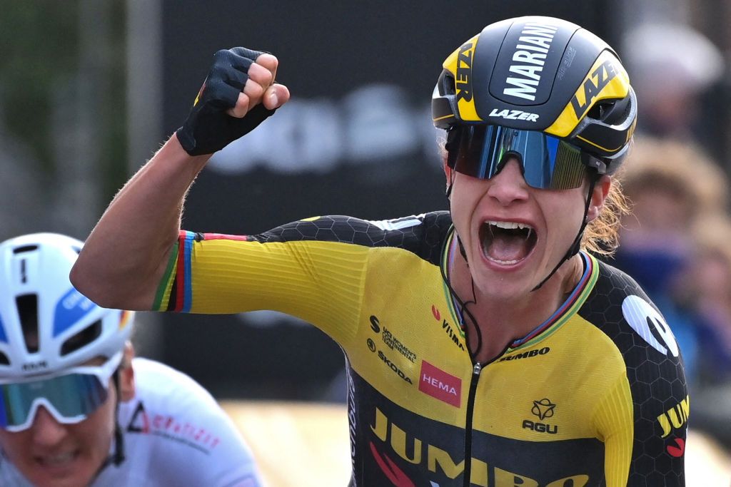 Dutch Marianne Vos celebrates as she crosses the finish line to win the womens edition of the GentWevelgem In Flanders Fields 2475 kilometers road cycling race from Ypers to Wevelgem on March 28 2021 Belgium OUT Photo by DAVID STOCKMAN various sources AFP Belgium OUT Photo by DAVID STOCKMANBelgaAFP via Getty Images