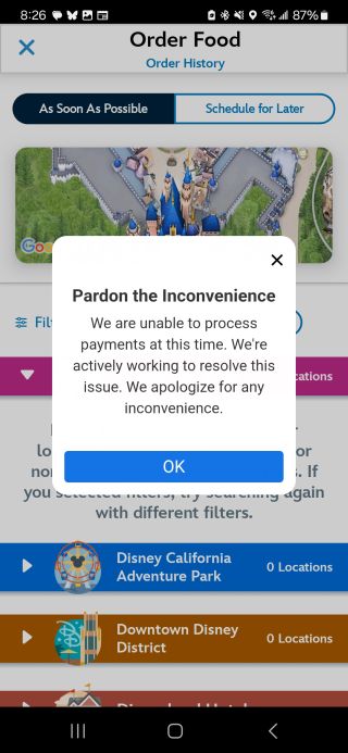 Disneyland app screenshot with notice that payment processing is down.