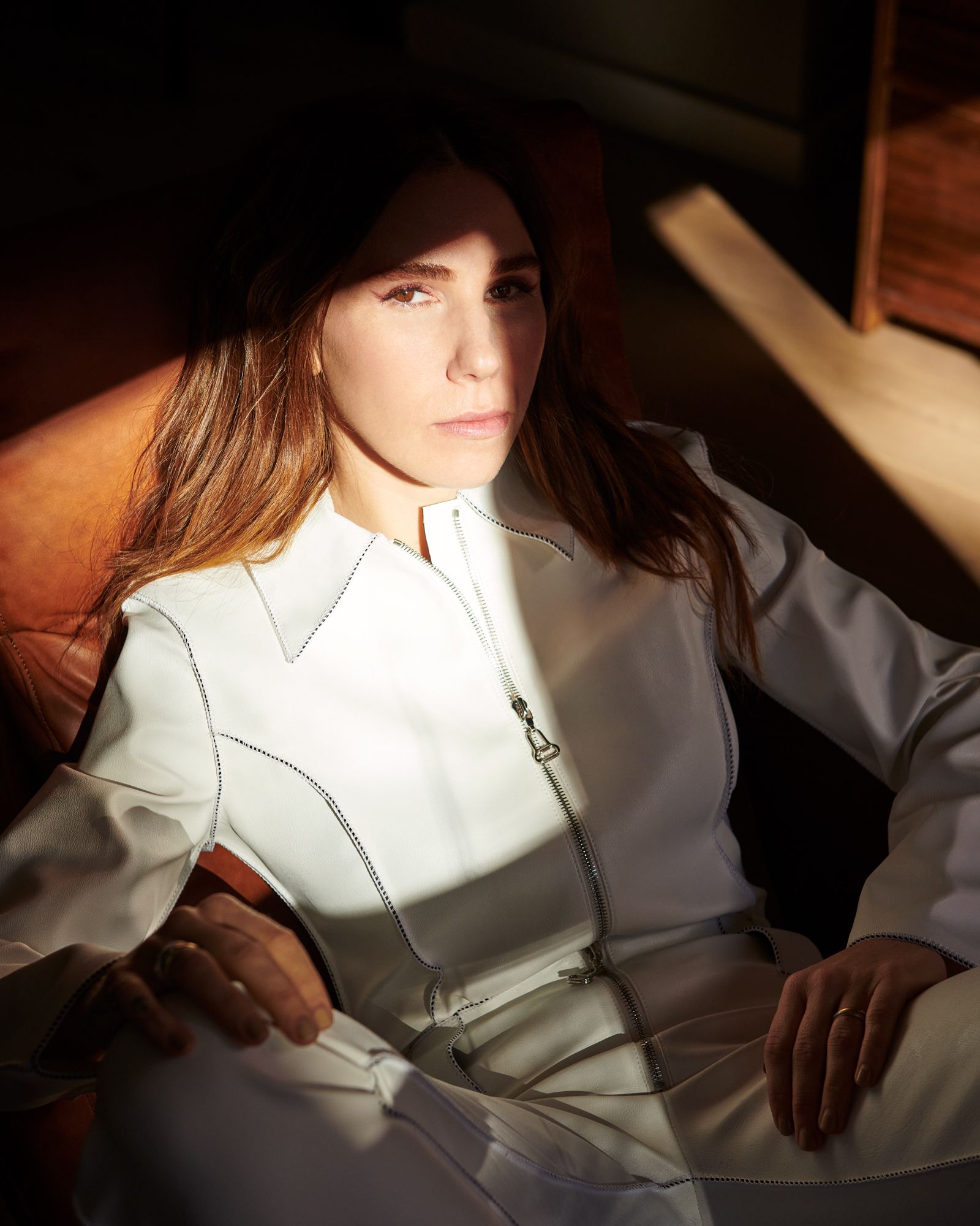 Zosia Mamet looks into the camera