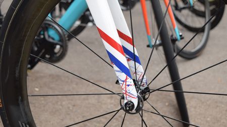 The splatter design is separated from the clean white design with coloured bands in British national colours