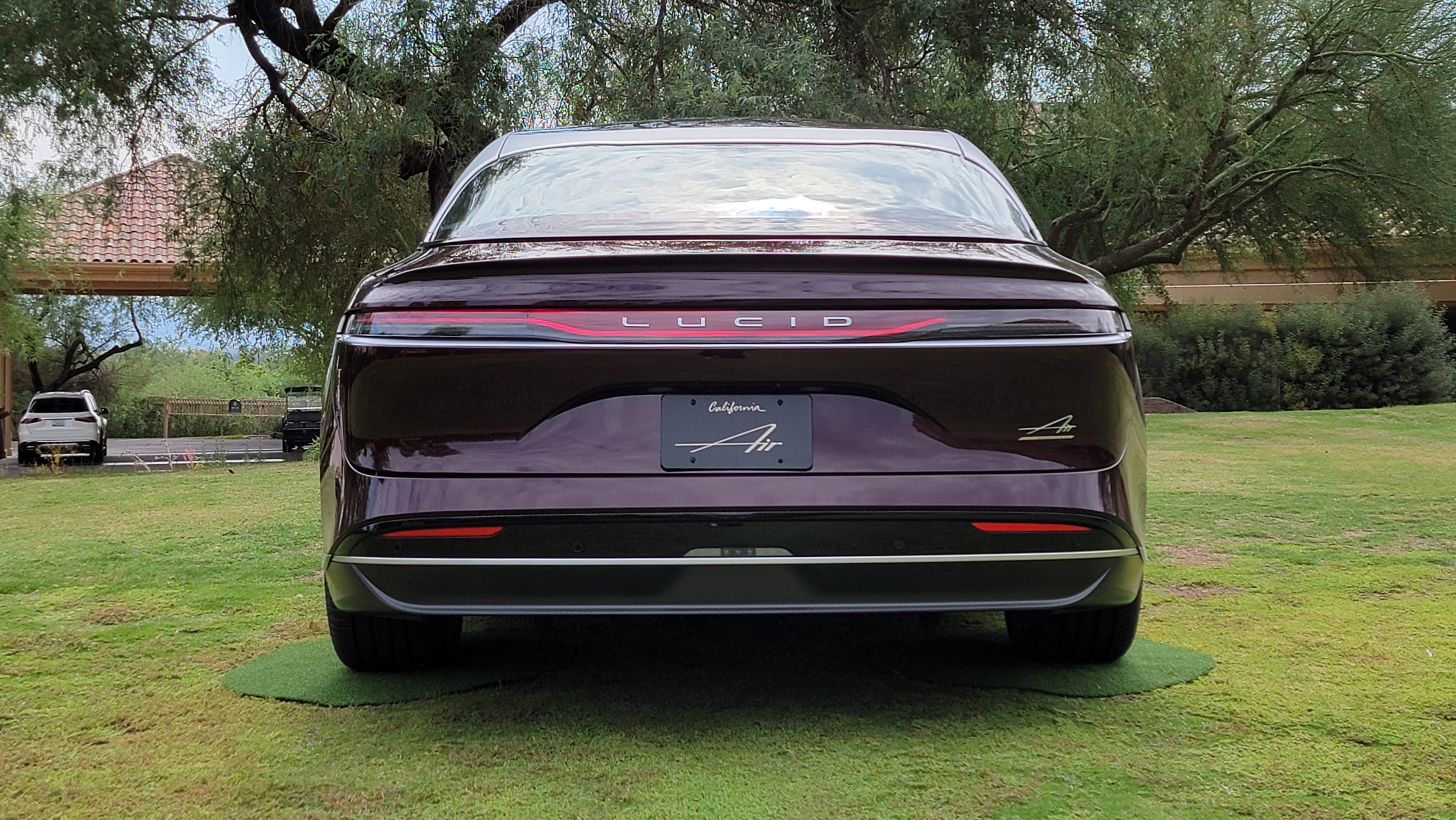 Rear view of car parked on glass