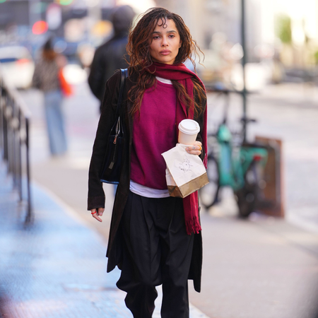 An image of Zoe Kravitz wearing the colourful knitwear trend. 
