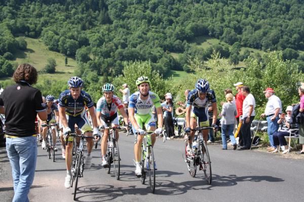 The back markers make their way up the last climb